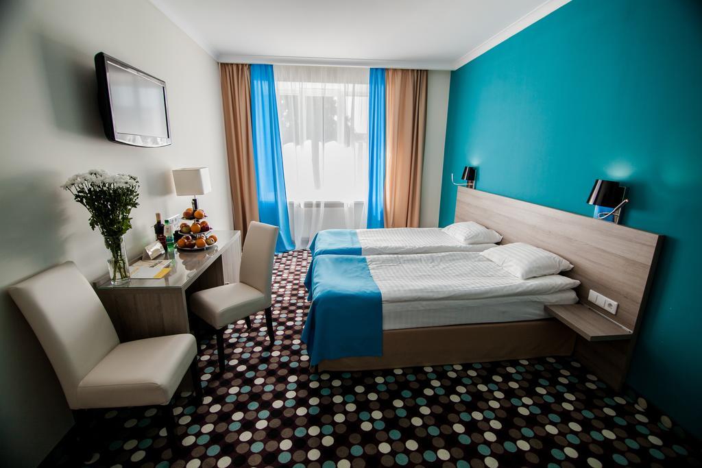 Hotel Optima Rivne Pokoj fotografie